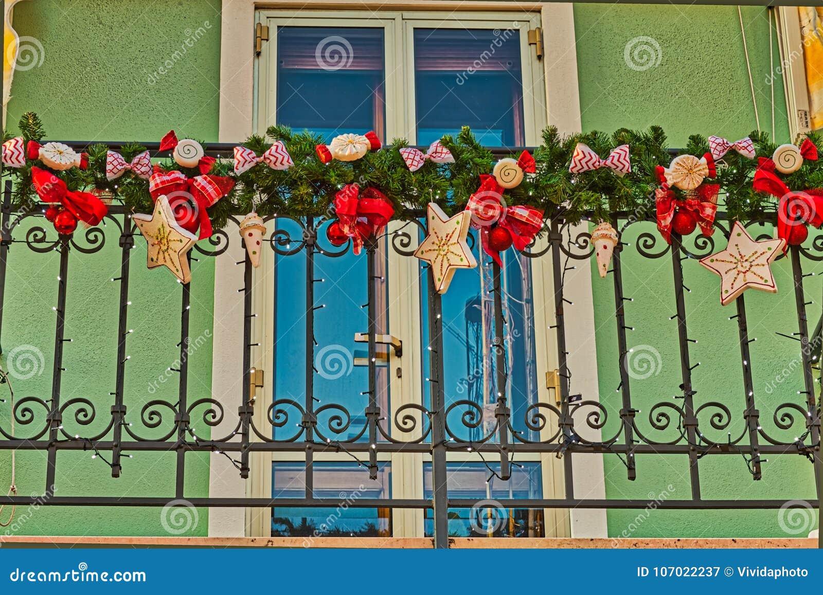 Christmas Decorations on a Balcony Stock Image - Image of railing ...