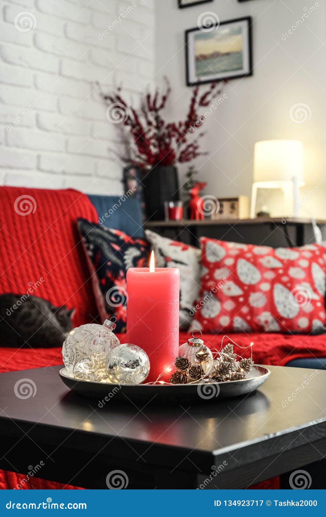 Christmas Decorations with Candle on Coffee Table Stock Image ...