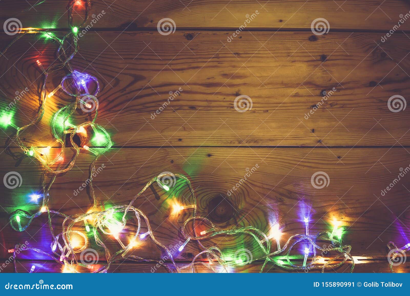 Christmas Decorative Lights. Christmas Garland Lights on Wood. Colorful ...