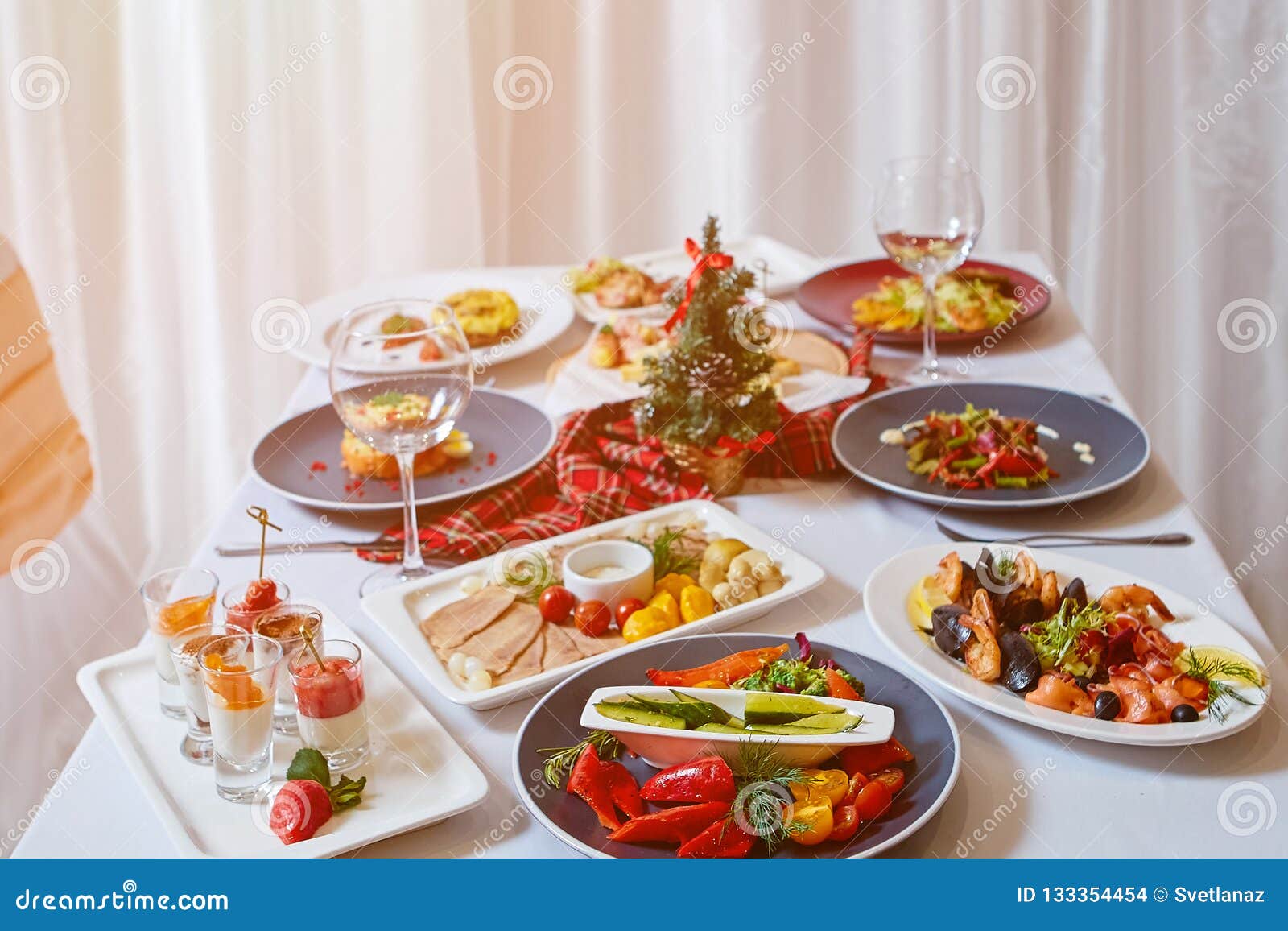 Christmas Dinner. a Table in the Restaurant, Served for Two People, is