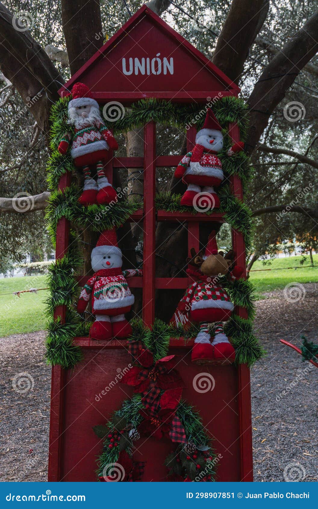 christmas dolls ganging from trees