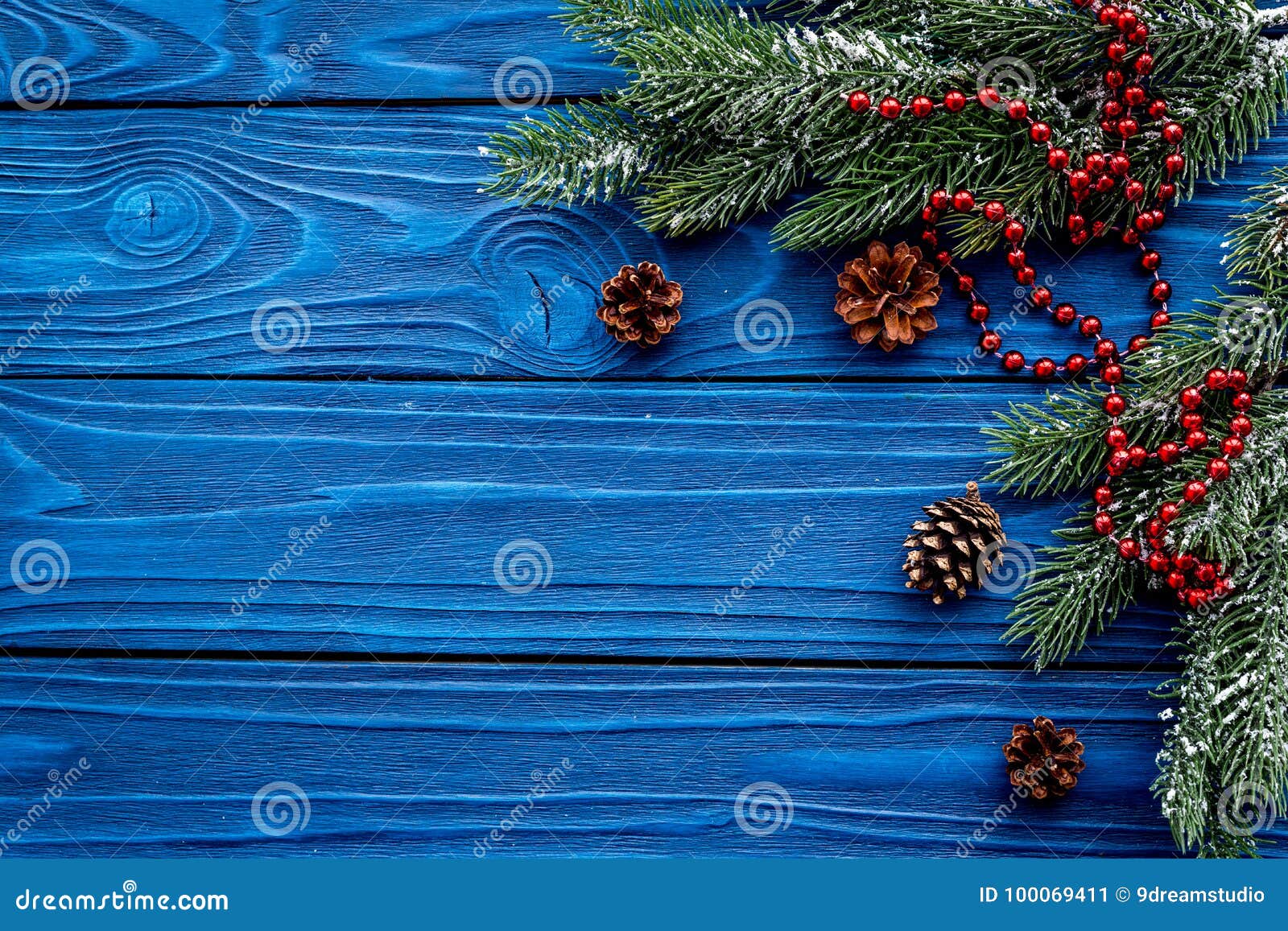 Christmas Eve Set with Spruce Branches, Pine Cones and Toys on Blue ...