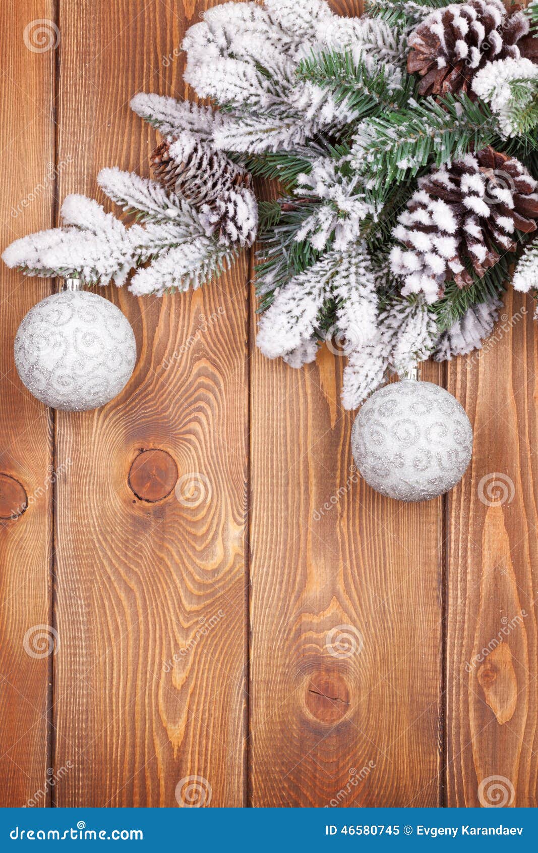 Christmas Fir Tree with Snow and Baubles on Rustic Wooden Board Stock ...