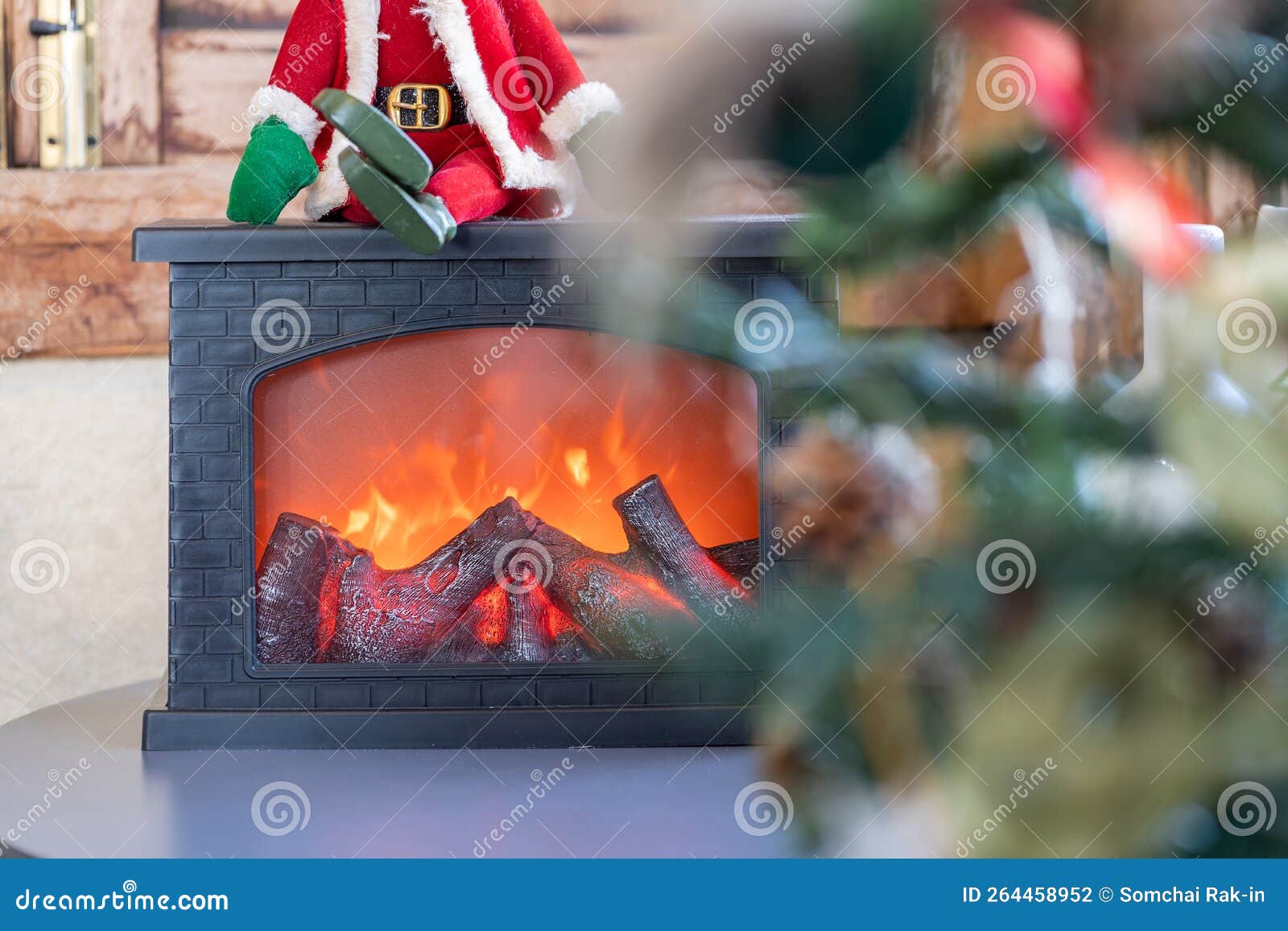 Christmas Fireplace Toy. Interior Decorated for Christmas Stock Photo