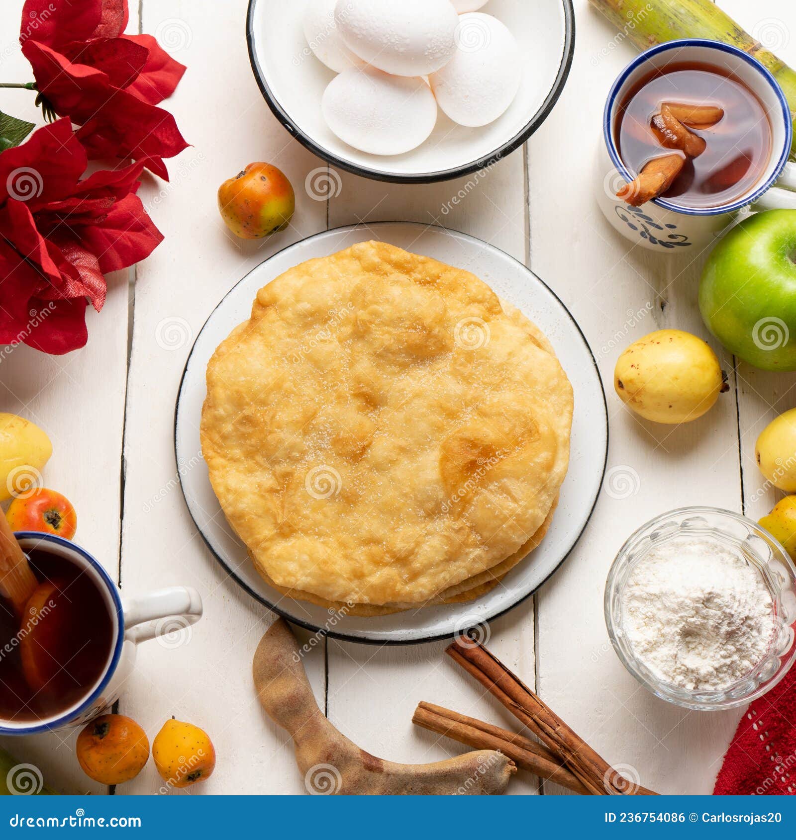 christmas fritters with piloncillo and cinnamon on a white background. mexican food