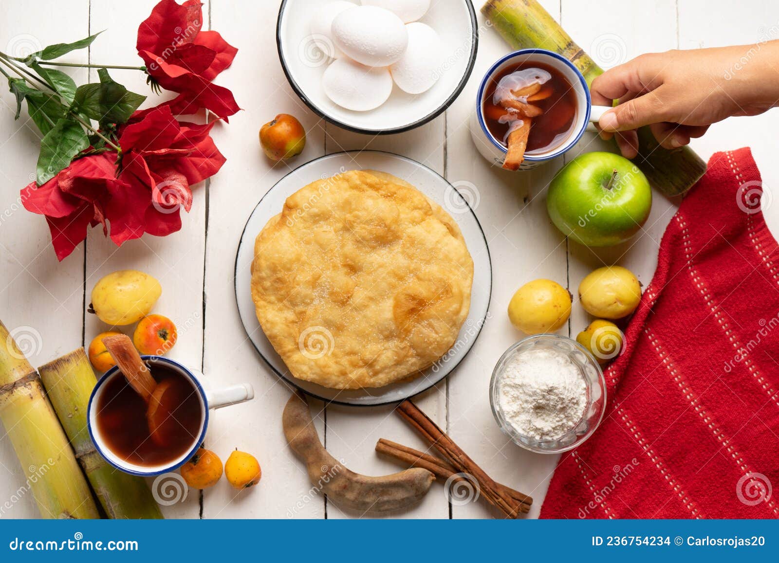 christmas fritters with piloncillo and cinnamon on a white background. mexican food