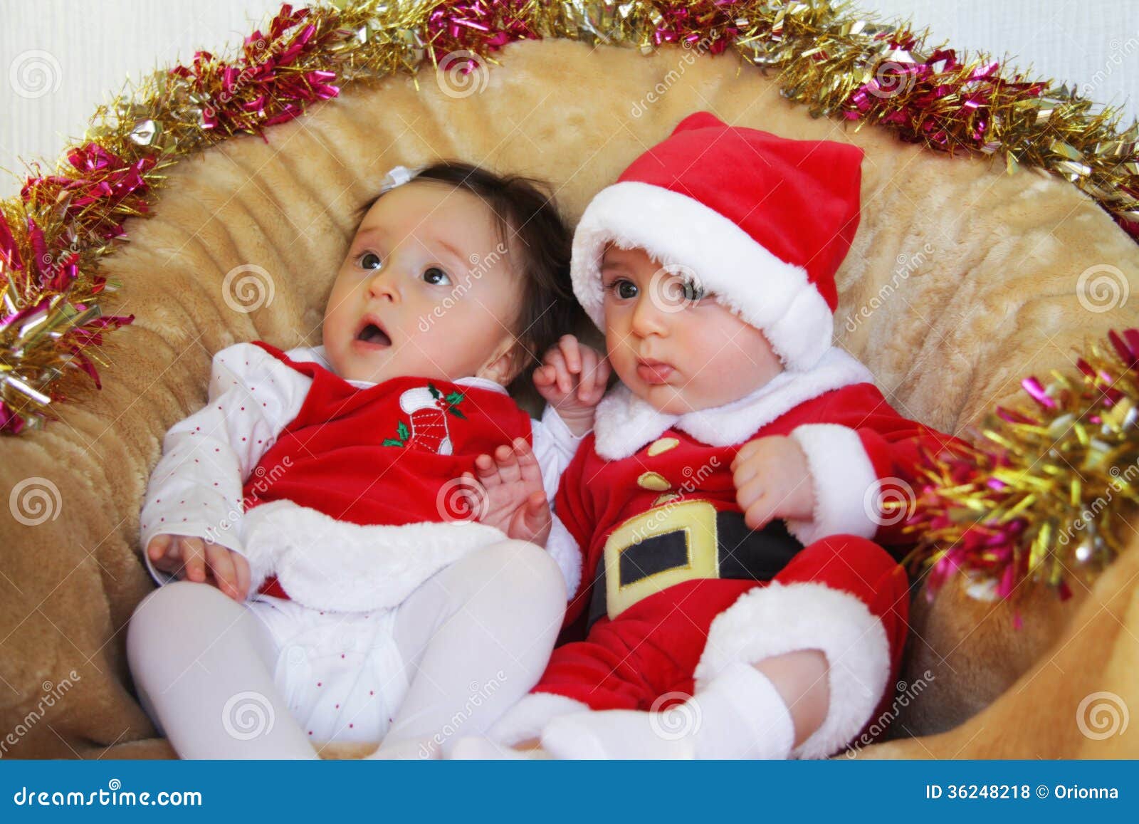 Christmas Funny Small Kids in Santa Claus Clothes. Stock Photo ...