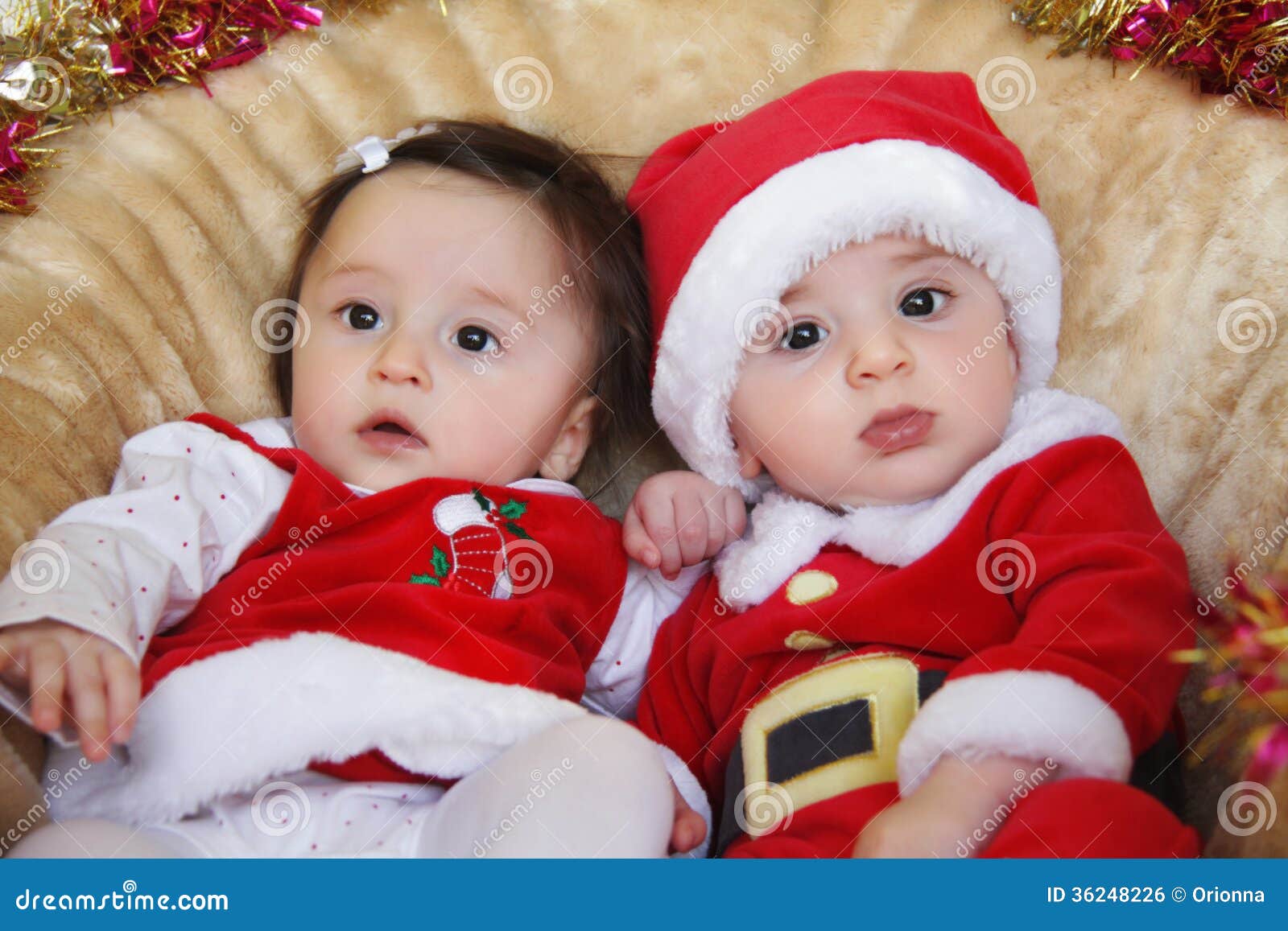 Christmas Funny Small Kids in Santa Claus Clothes. Stock Photo ...