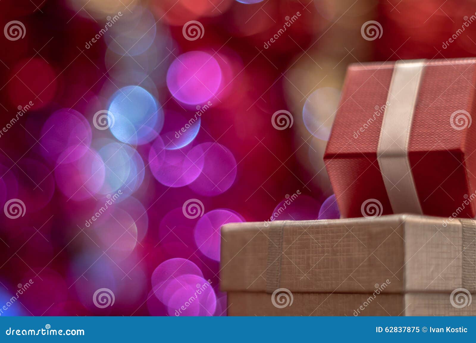 Christmas Gift on Defocused Lights Background Stock Image - Image of ...