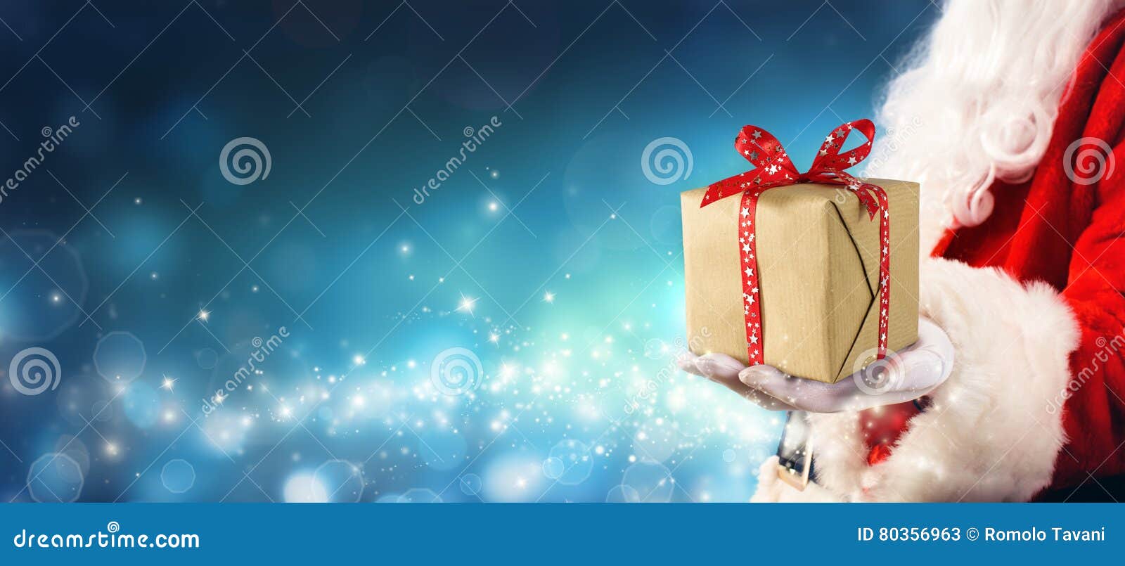 christmas gift - santa claus giving gift box