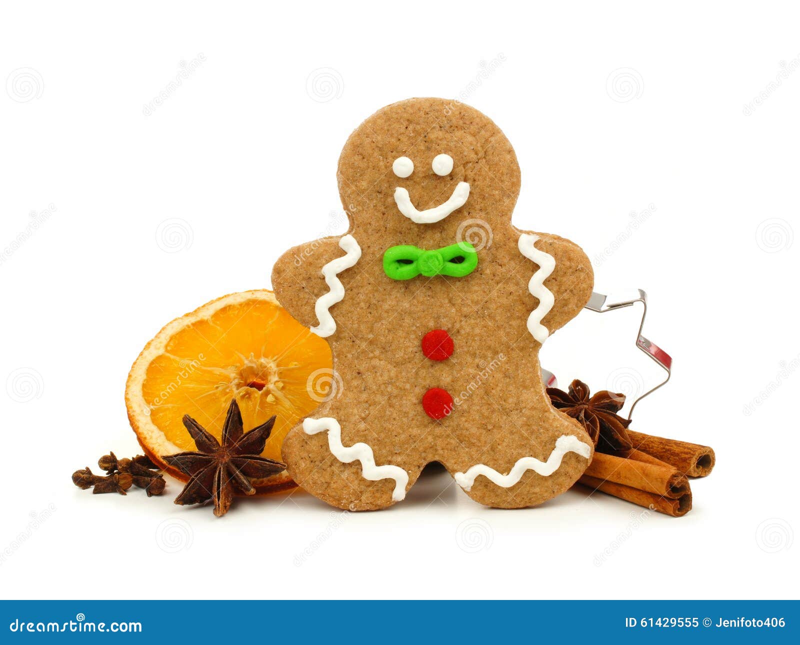 Christmas gingerbread man with holiday spices over white