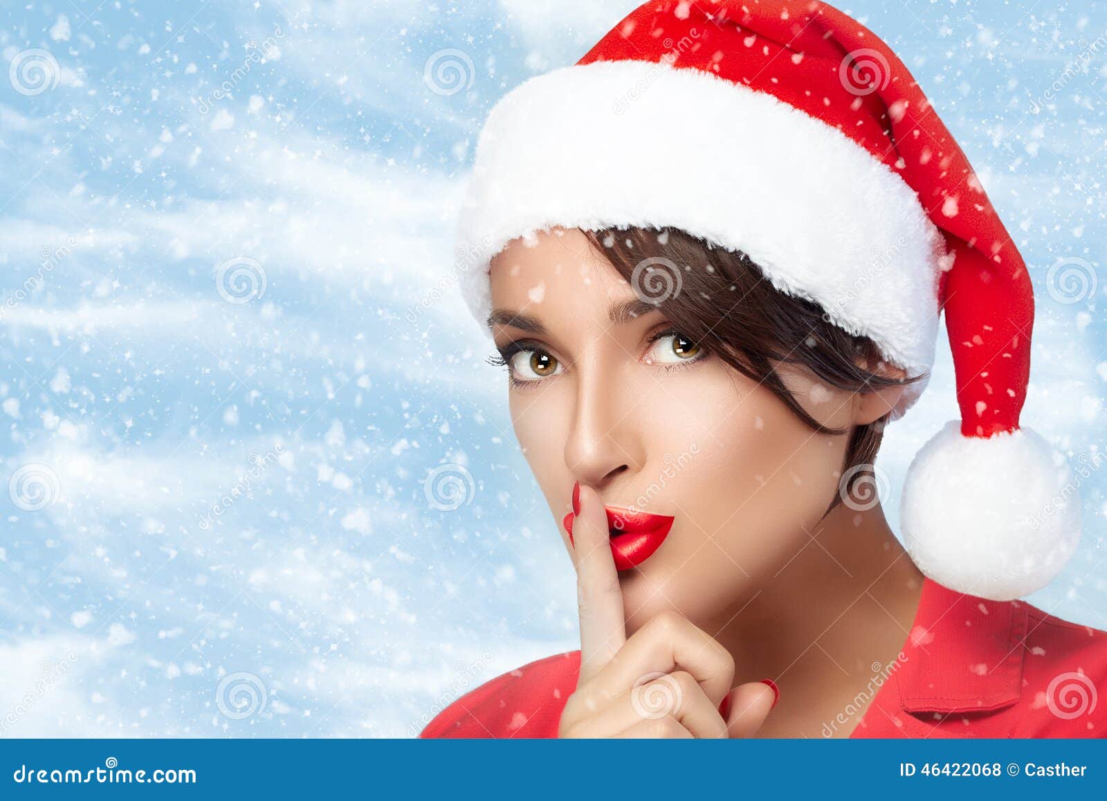 Christmas Girl in Santa Hat Doing a Hush Sign. Fashion Christmas Stock ...