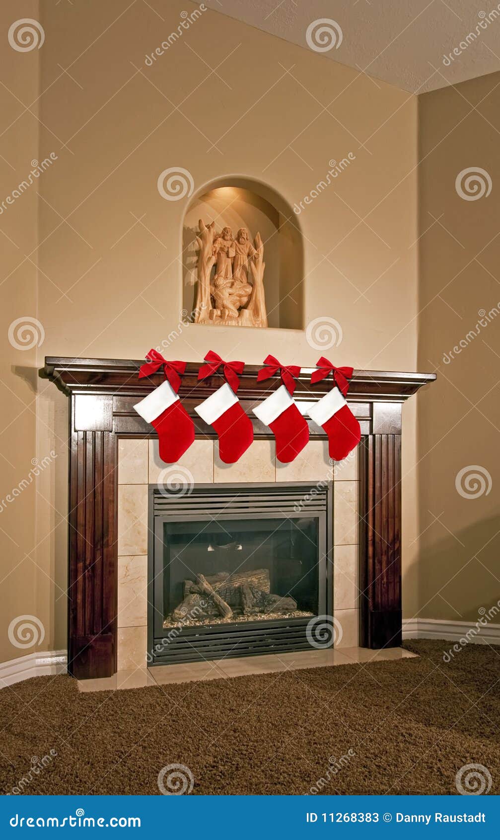 christmas holiday stockings on fireplace mantel