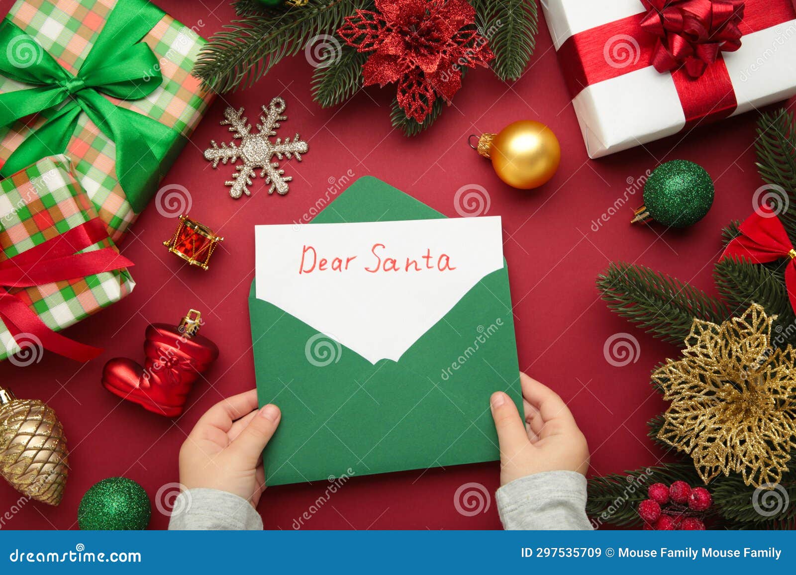 christmas letter from a child to santa claus with the words: dear santa. christmas composition with yellow and green toys