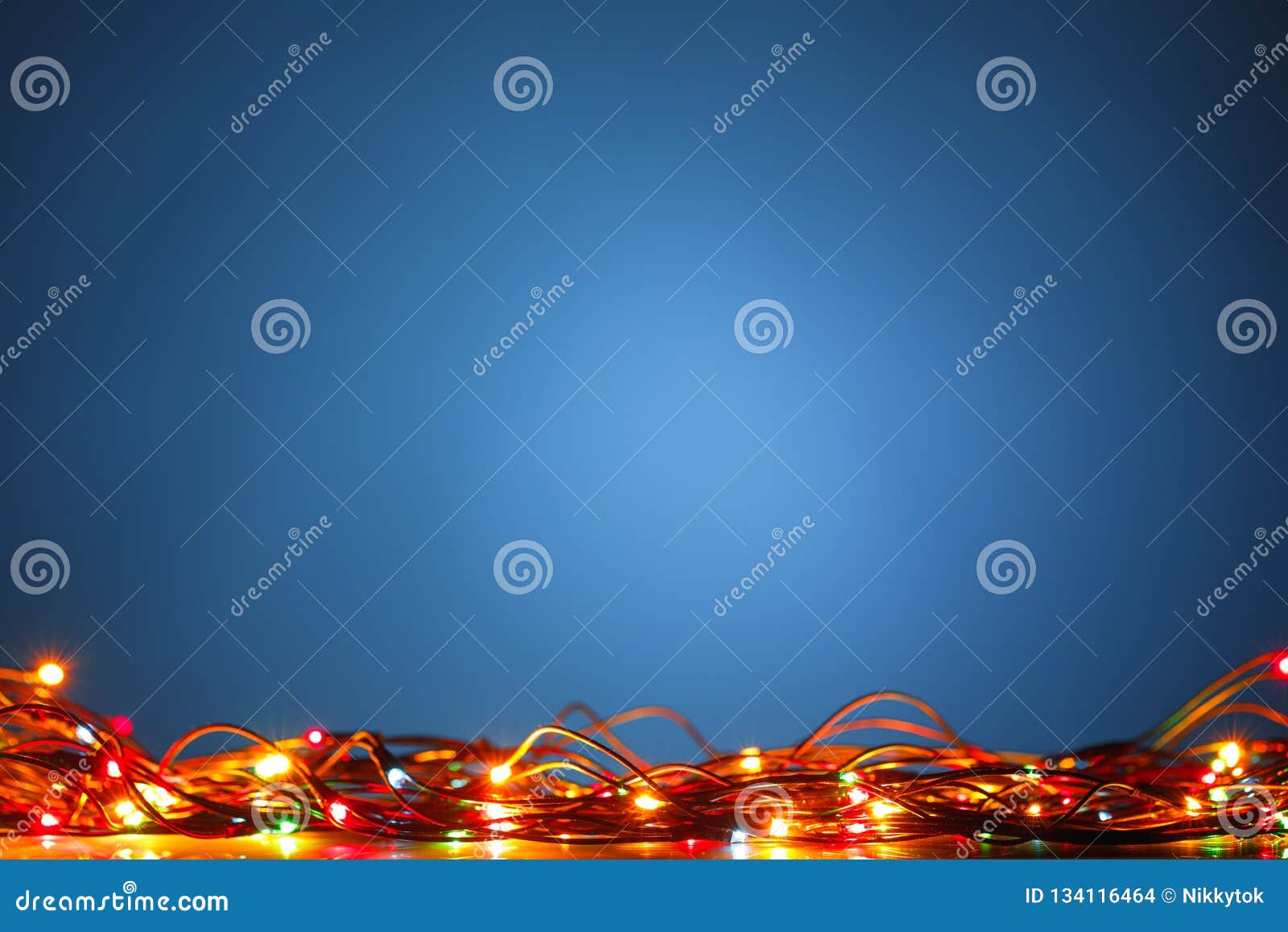 Christmas Lights on Blue Background Stock Photo - Image of backdrop