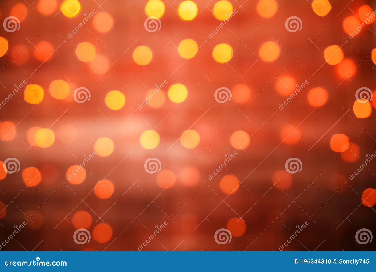 Christmas Lights of a Garland in Defocus. Yellow and Red Christmas