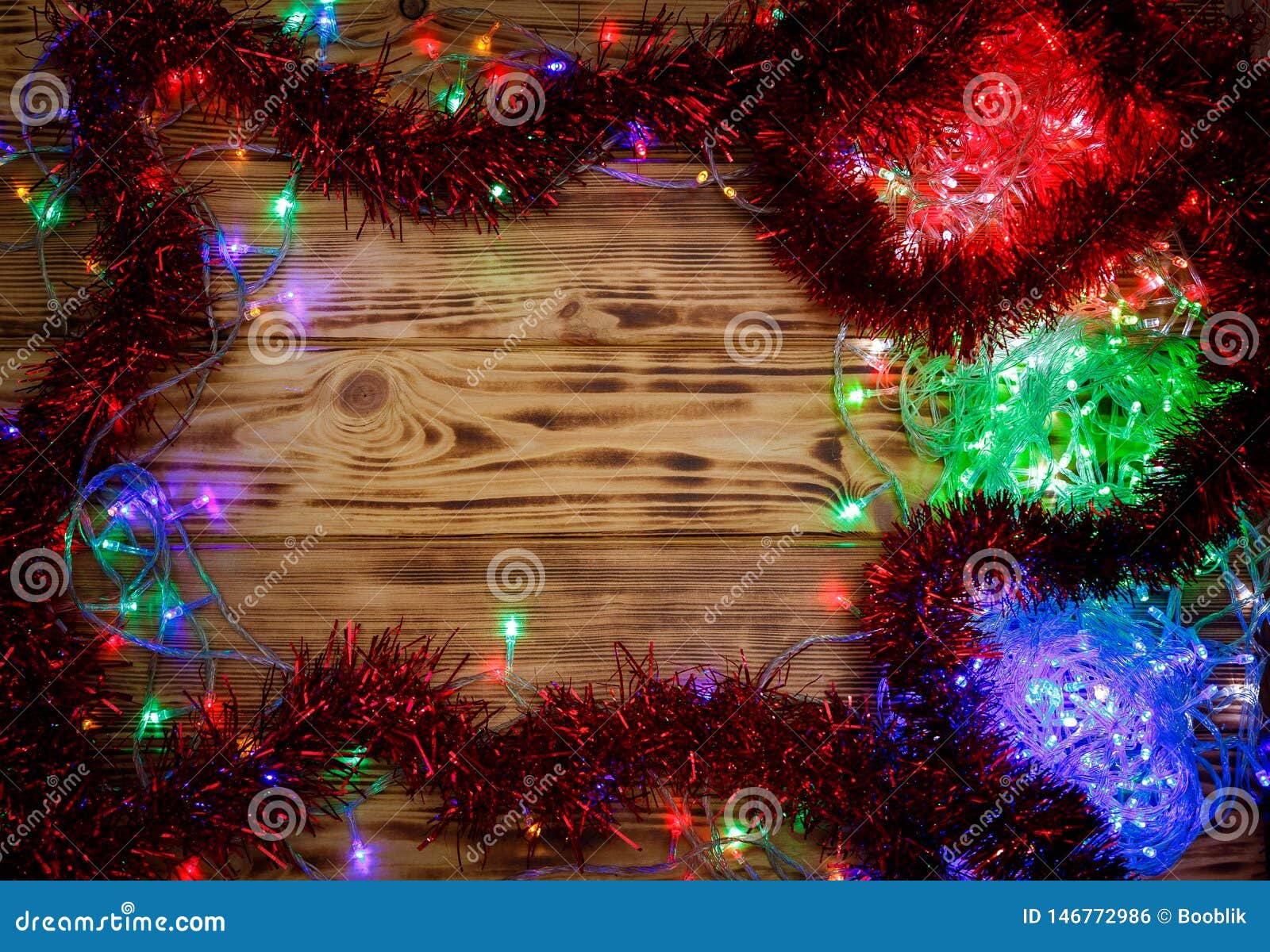 Christmas Lights and Tinsel on Wooden Background Stock Photo - Image of ...