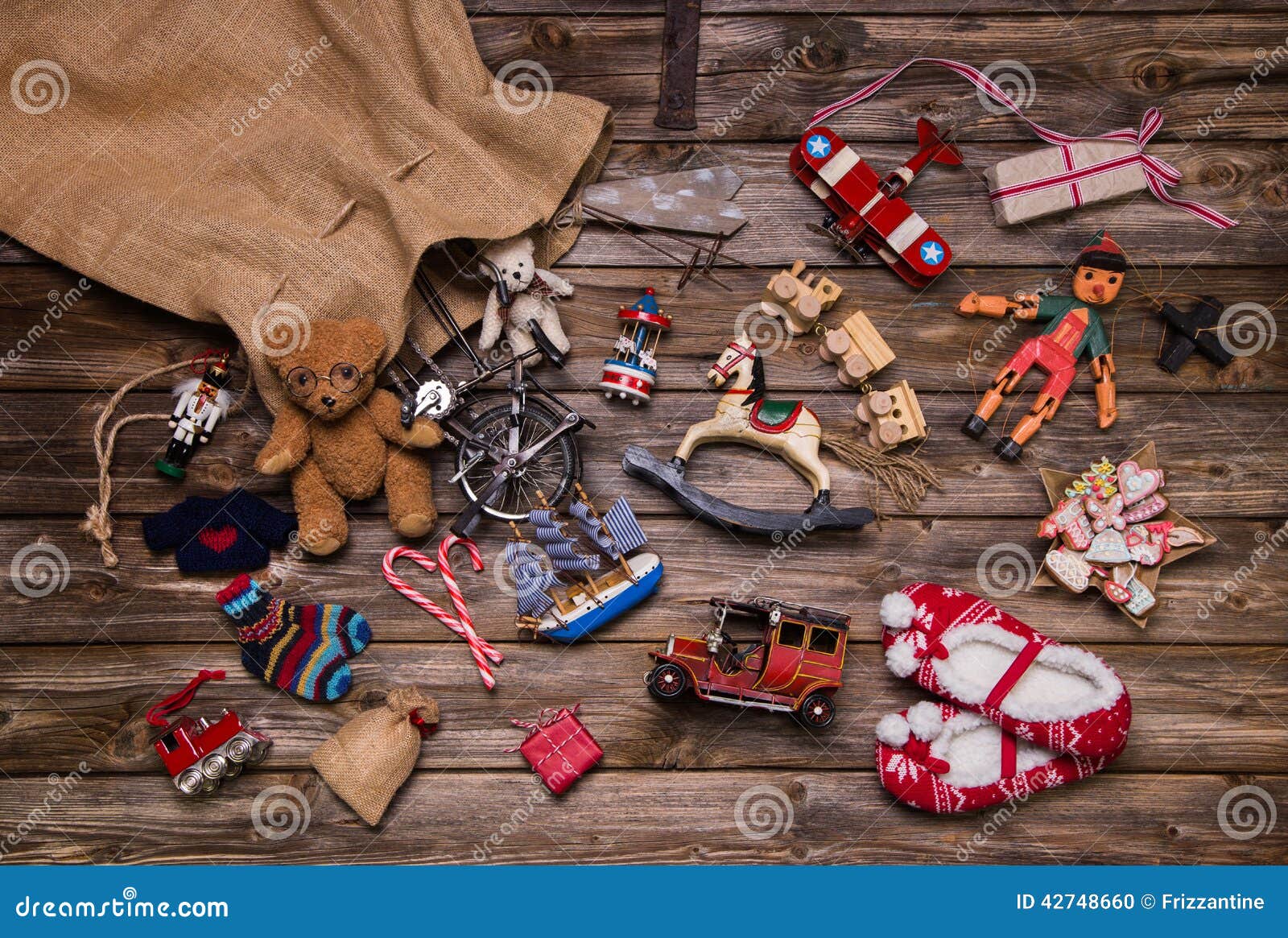 christmas memories in childhood: old and tin toys on wooden back