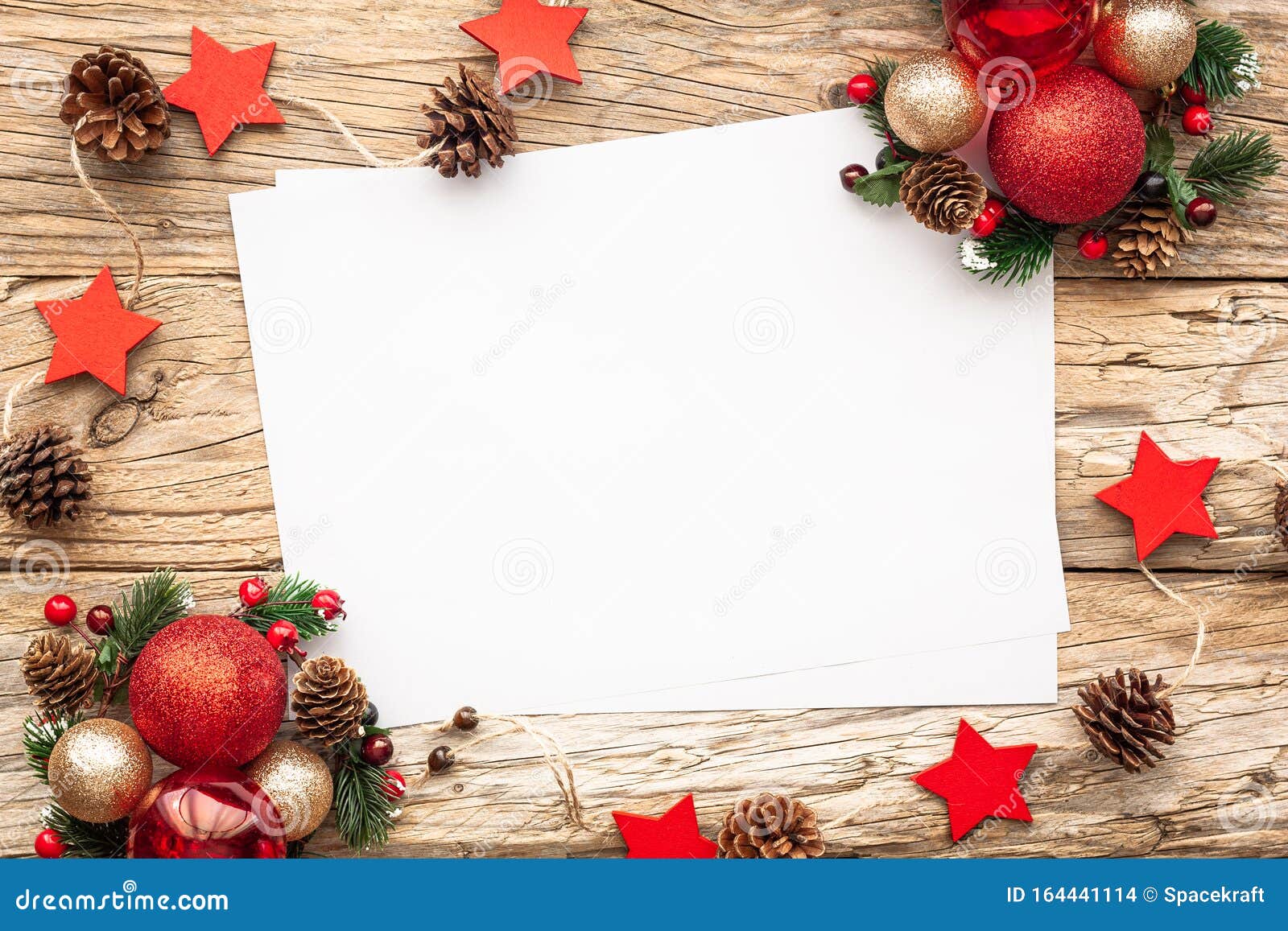 Old parchment paper with copy space on Christmas tree branch background  Stock Photo by natika