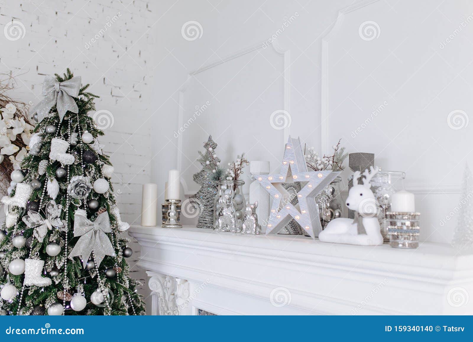 Christmas and New Year White and Silver Decorations on Fireplace in ...