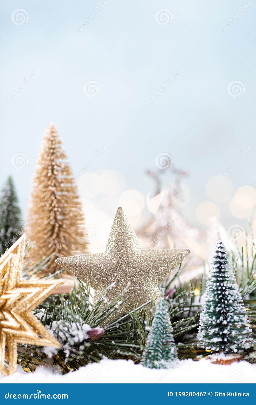 Christmas Ornament with String Lights on Blue Background Stock Image