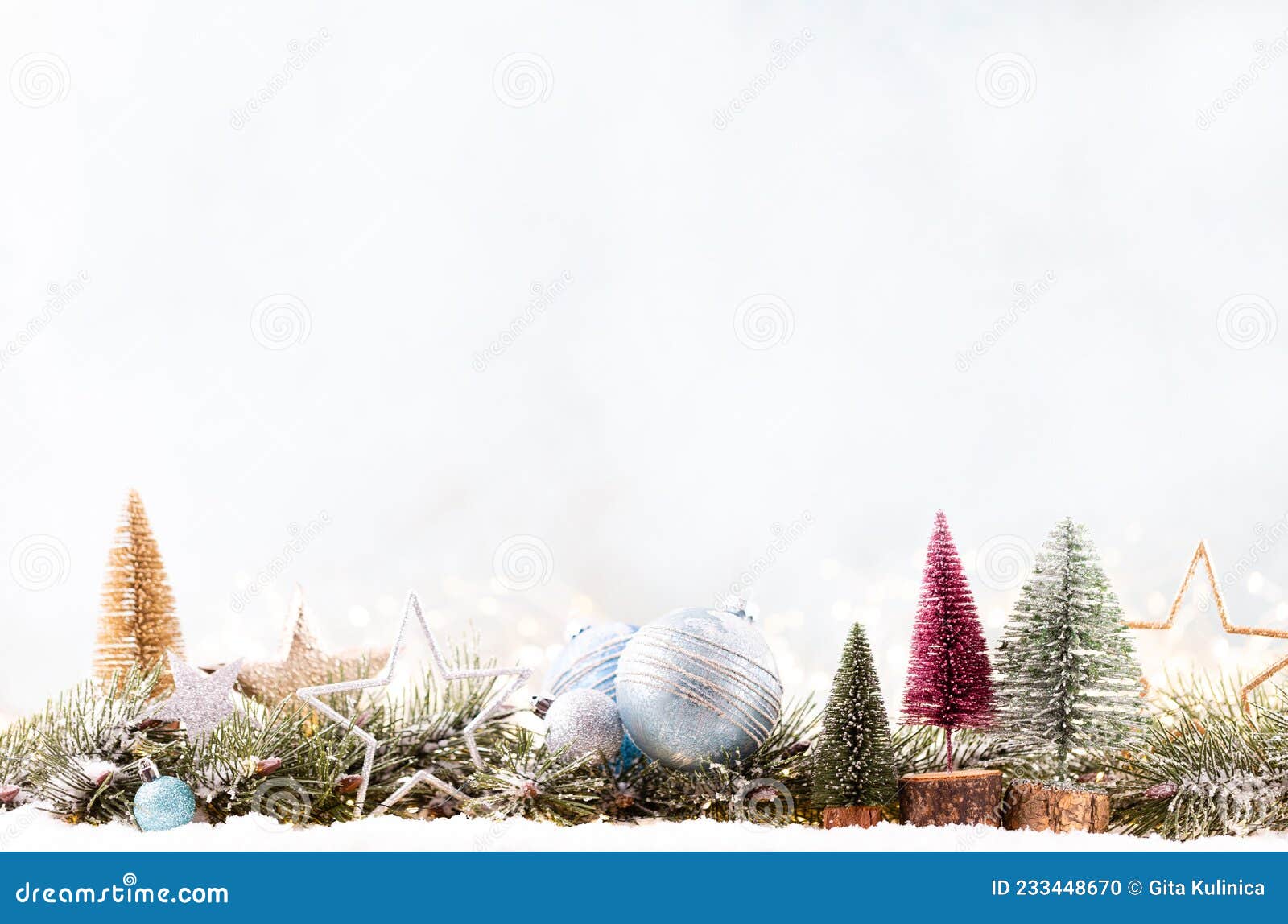 Christmas Ornament with String Lights on Blue Background Stock Photo