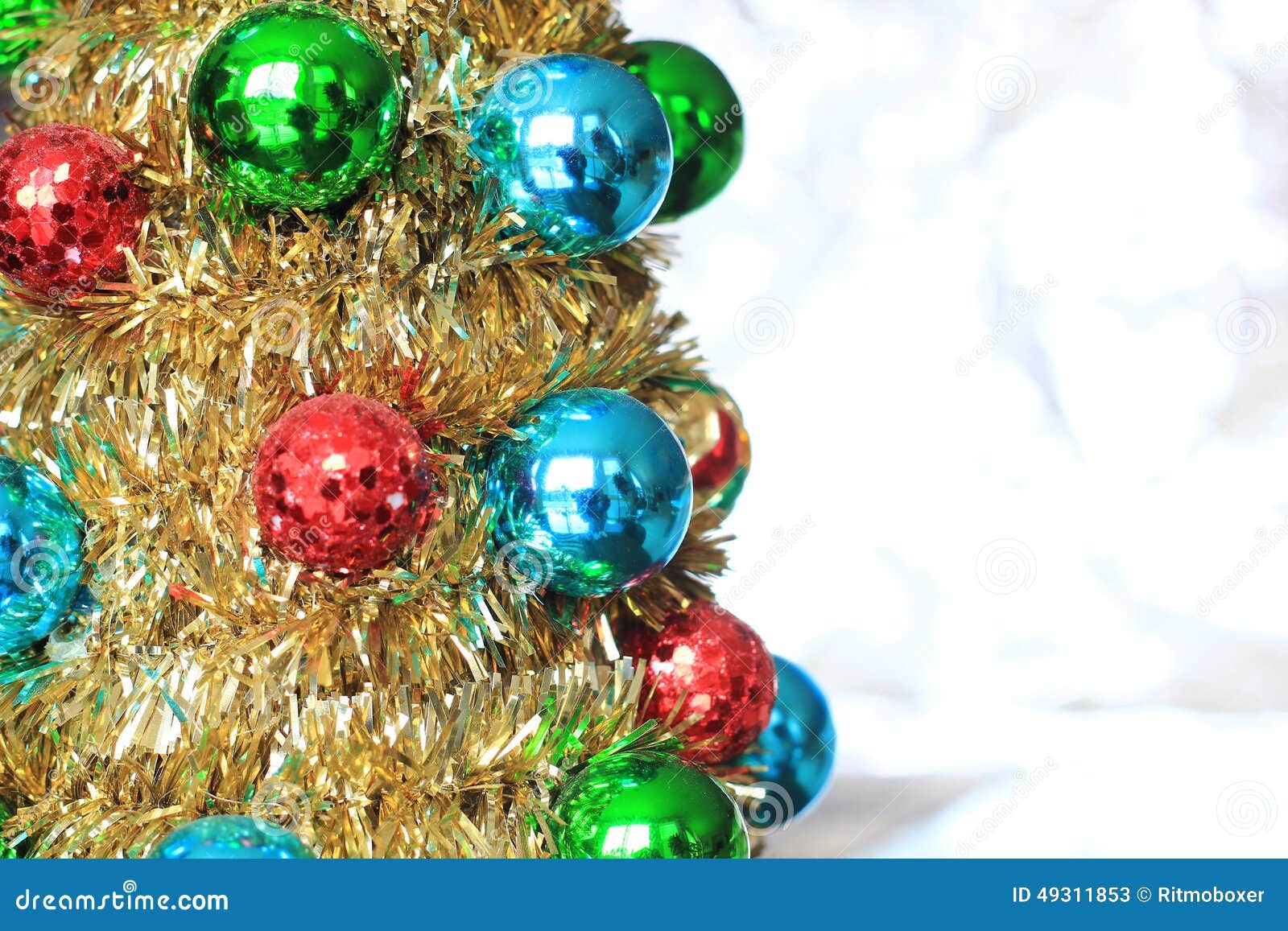 Christmas Ornaments on a Gold Tinsel Tree Stock Image Image of