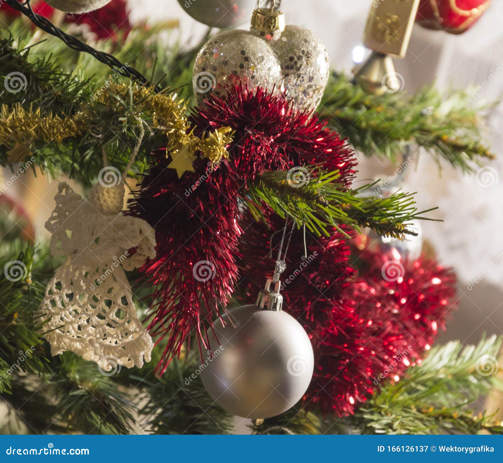 Christmas Ornaments on a Pine Tree Background. Decorations on Evergreen