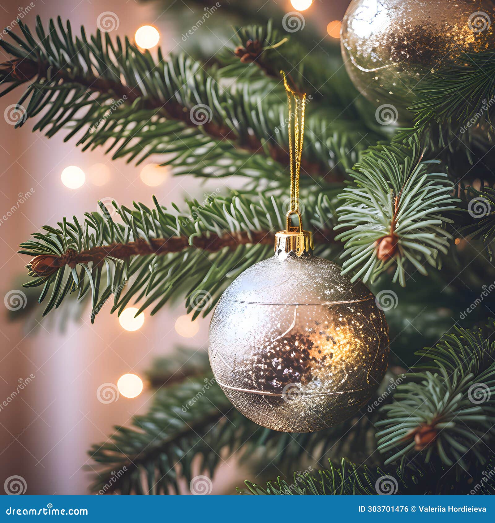 Christmas Pine Tree with Sparkly Silver Baubles and Lights Closeup ...