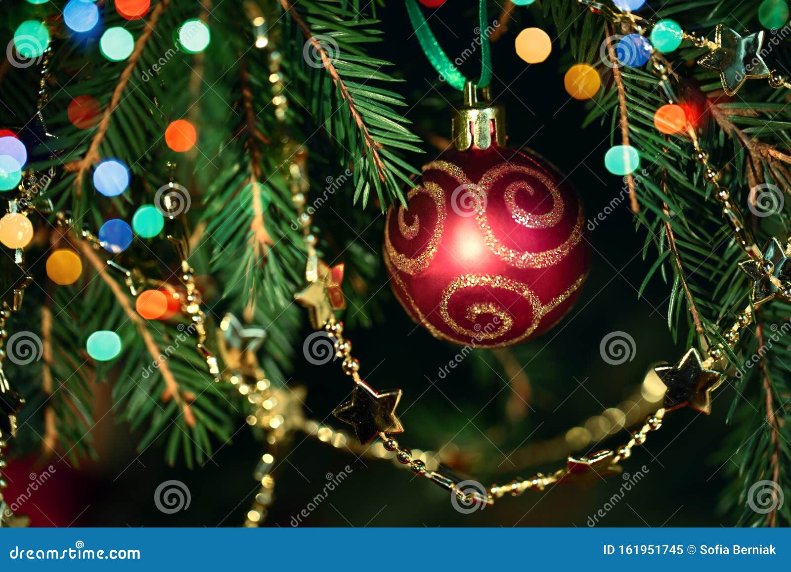 Christmas Red Bauble on Tree with Bokeh Lights Stock Image - Image of ...