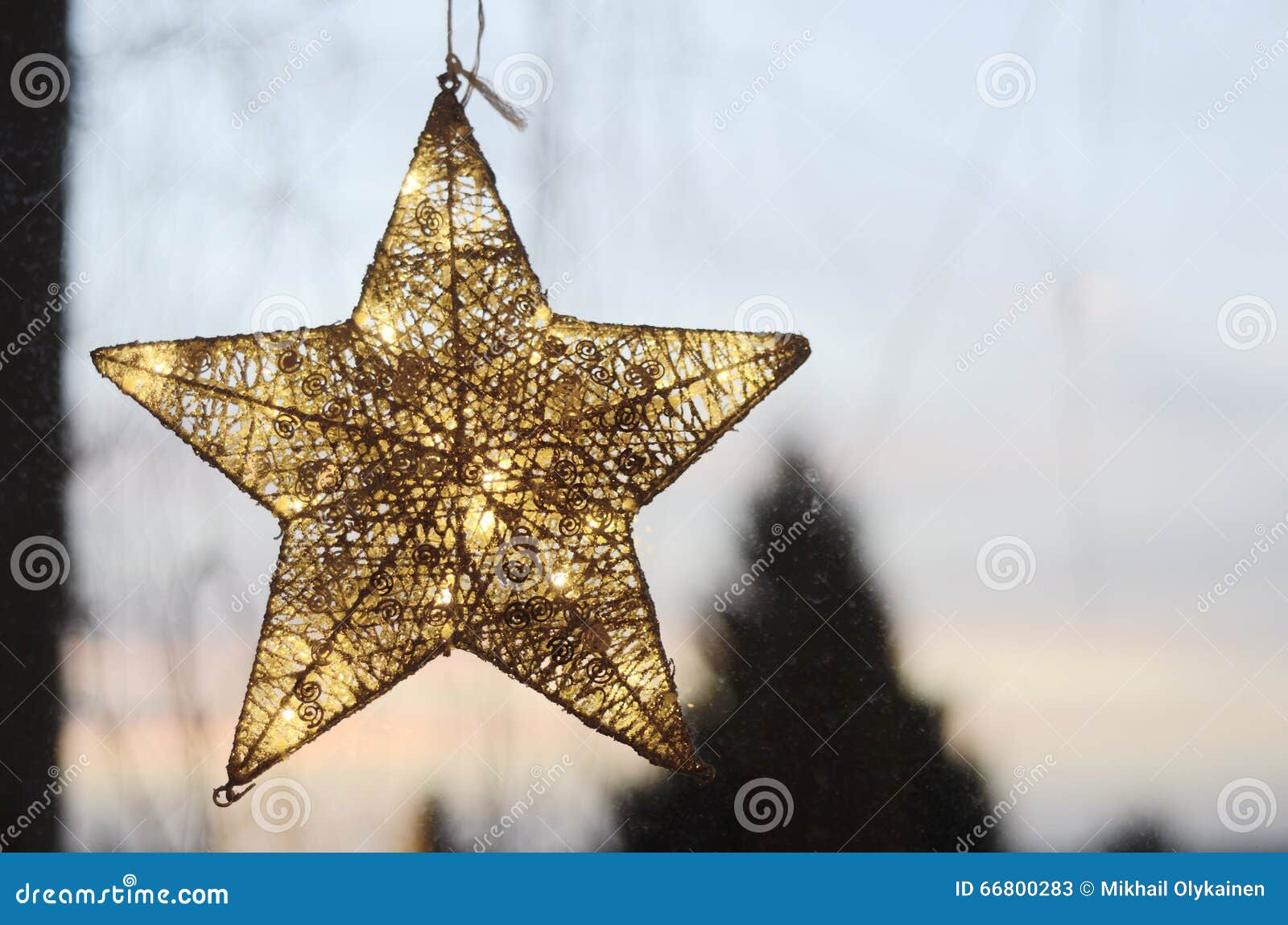 Christmas star on a window stock image. Image of line 66800283