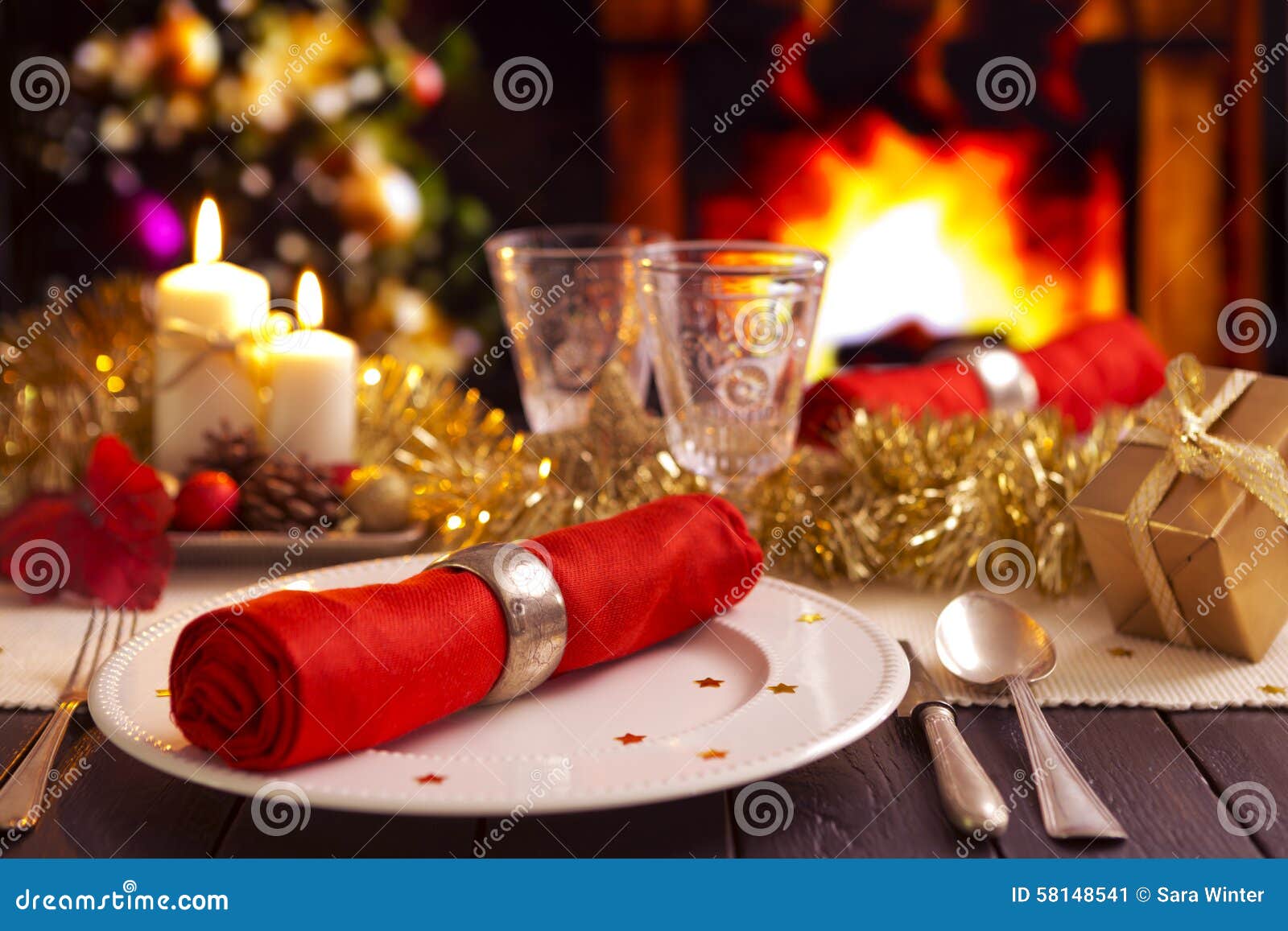Christmas Table With Fireplace In The Background Stock 