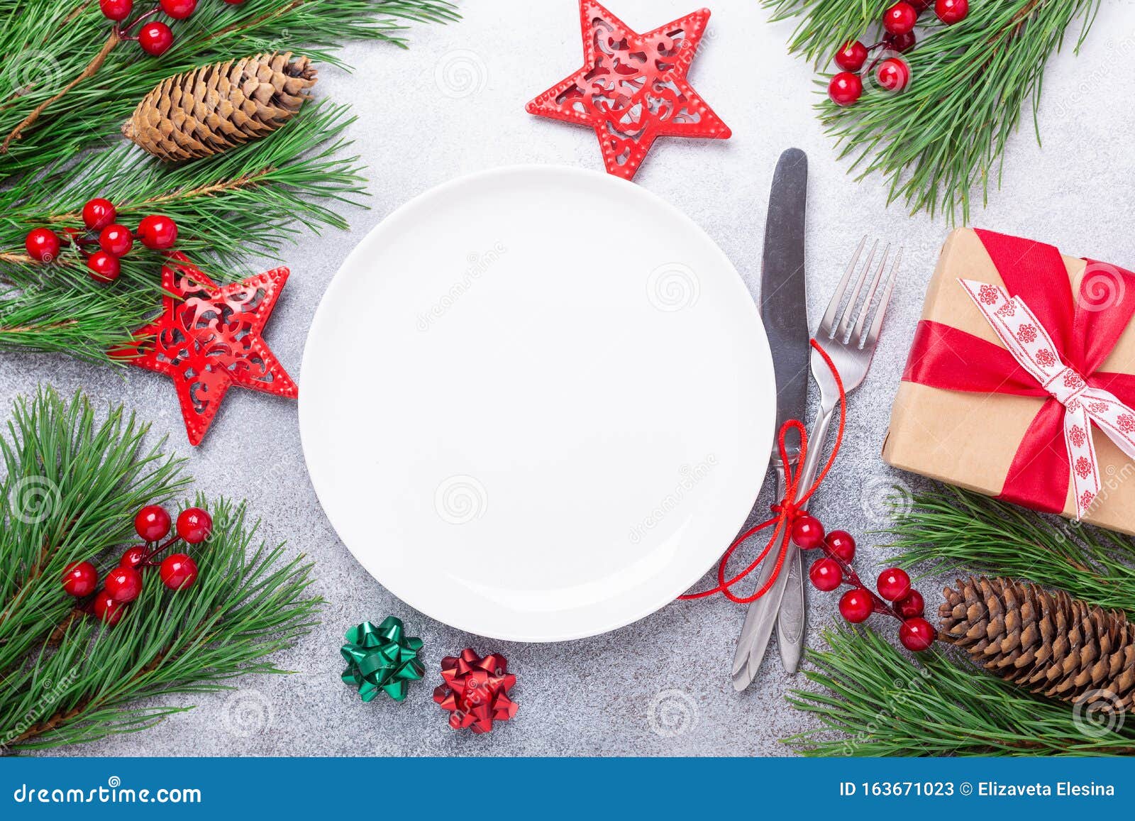 Christmas Table Place Setting with Empty White Plate, Gift Box, Cutlery ...