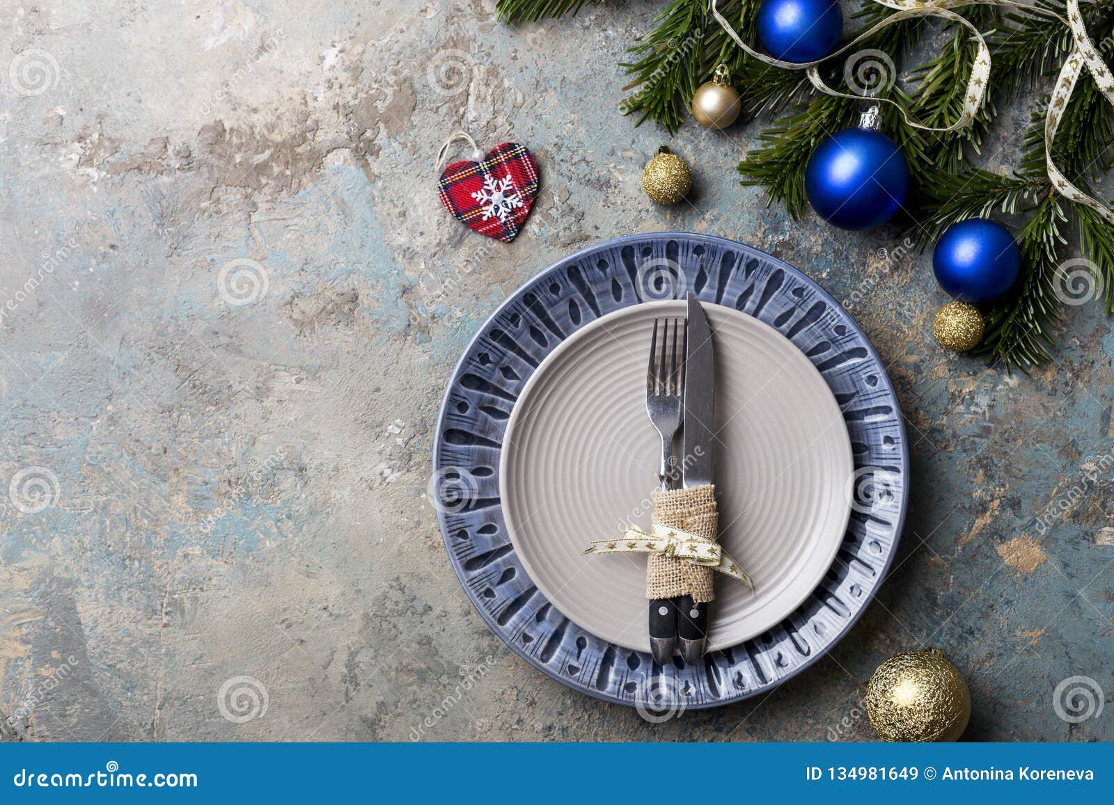 Christmas Table Setting On Decor Background. Blue And Gray Plate ...