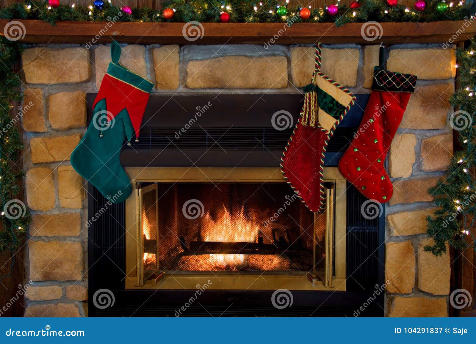 Christmas Three Stockings Hanging Over Fireplace Stock Image Image of