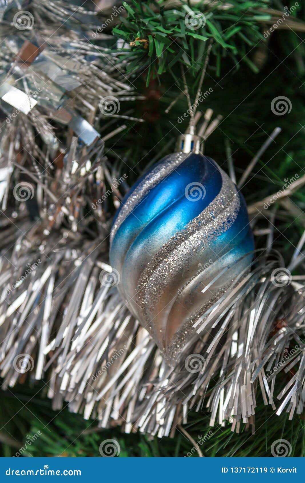 Christmas Toy In The Form Of A Big Icicle On A Christmas Tree With Tinsel Stock Image Image Of Abstract Background 137172119