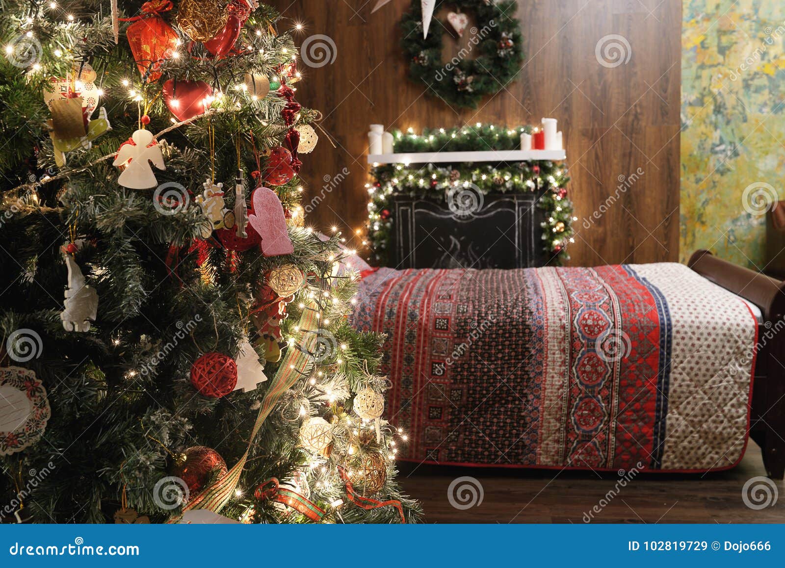 Christmas Tree, Bed and Fireplace. Stock Image Image of decor
