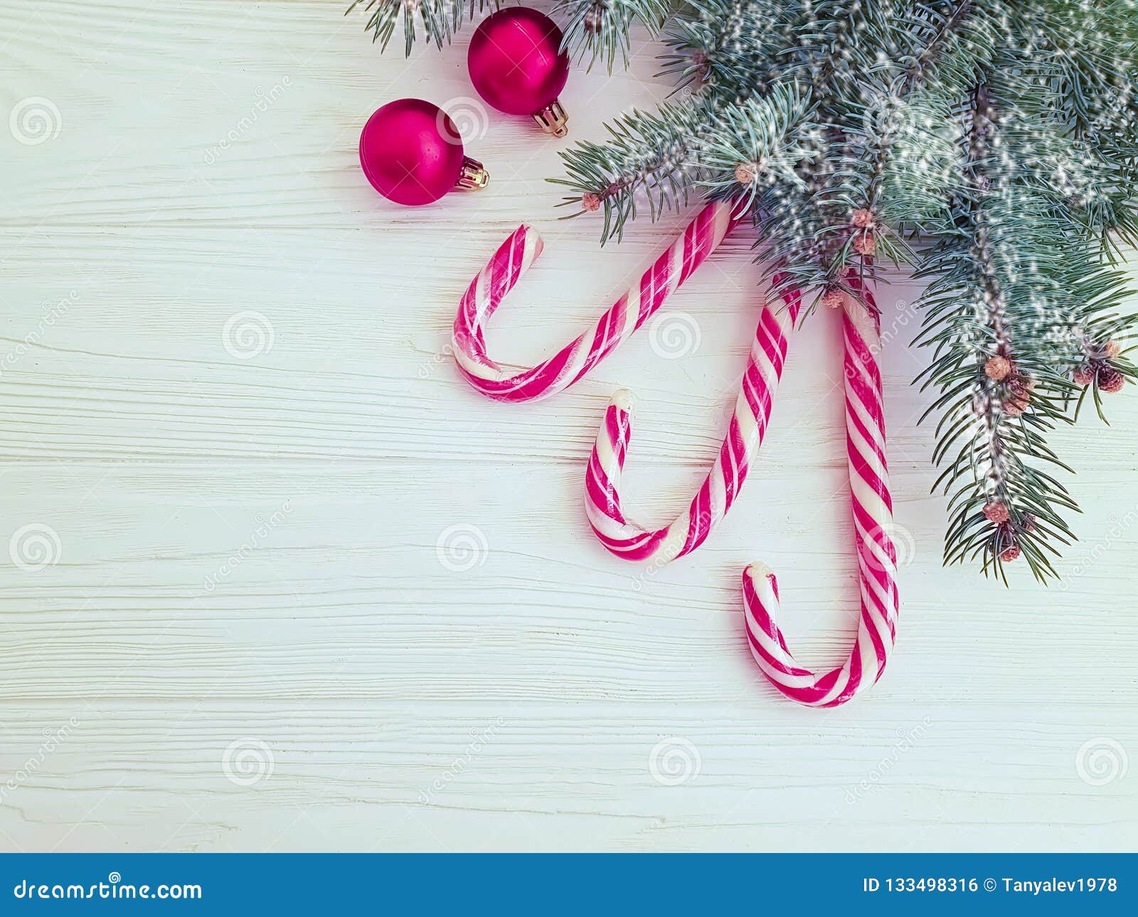 Christmas Tree Branch, Candy Holiday on a Wooden Background Stock Photo ...