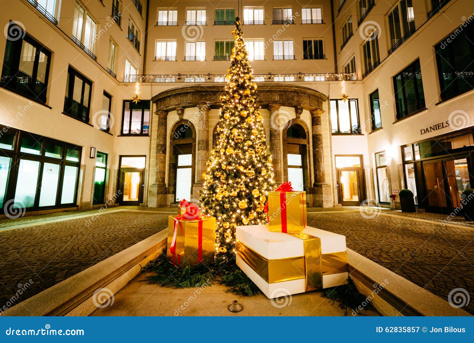 Christmas Tree and Buildings at Night, in Munich, Germany. Editorial