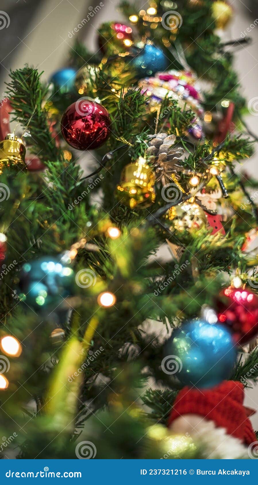 Christmas Tree Decorations with Christmas Lights in a Room, Close Up