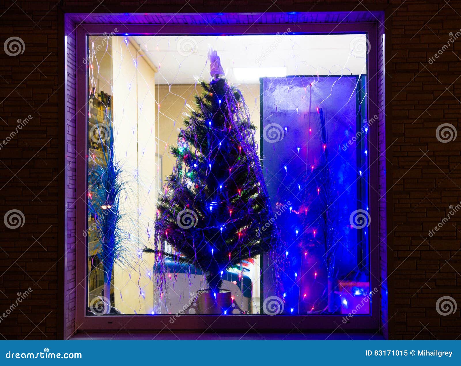 Christmas Tree in the Grocery Store Window. Stock Image Image of
