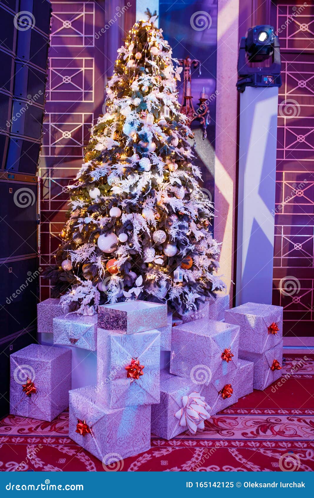 Christmas Tree with Light Garlands Decorating Toys with Gifts Stock ...