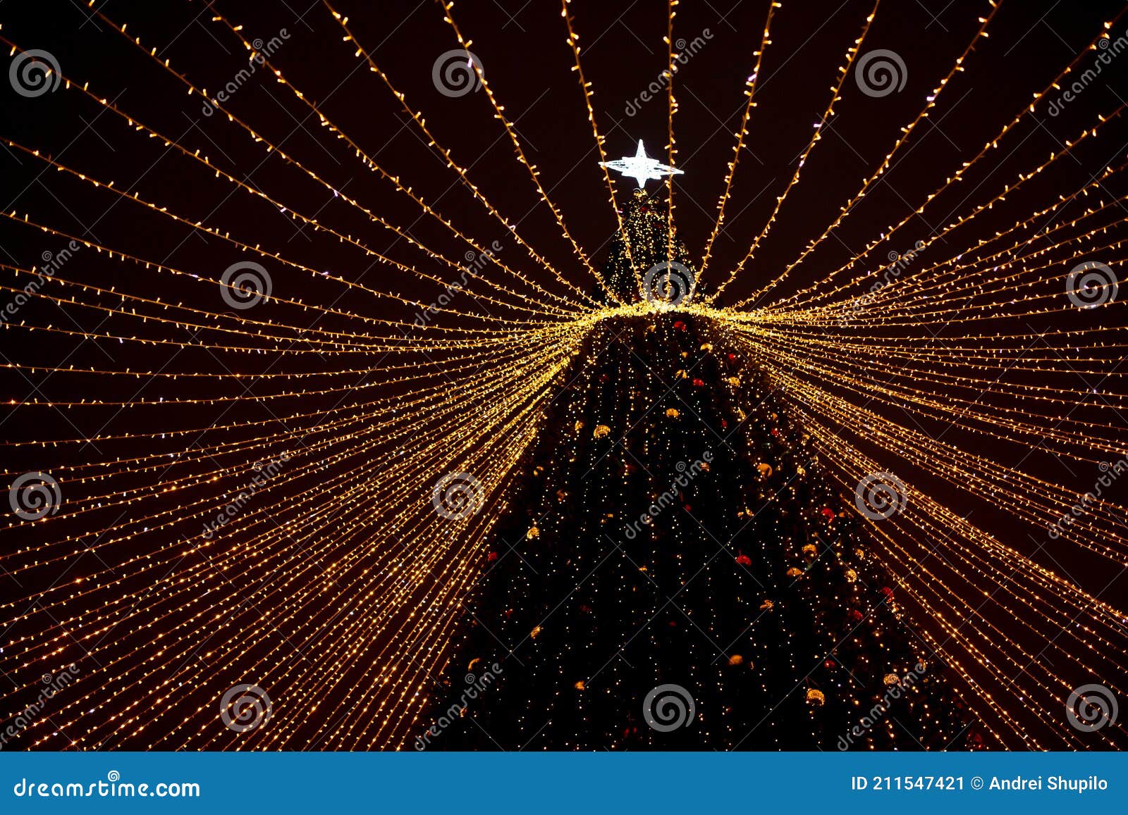 The Christmas Tree Lights Up in Garlands Stock Image Image of glow