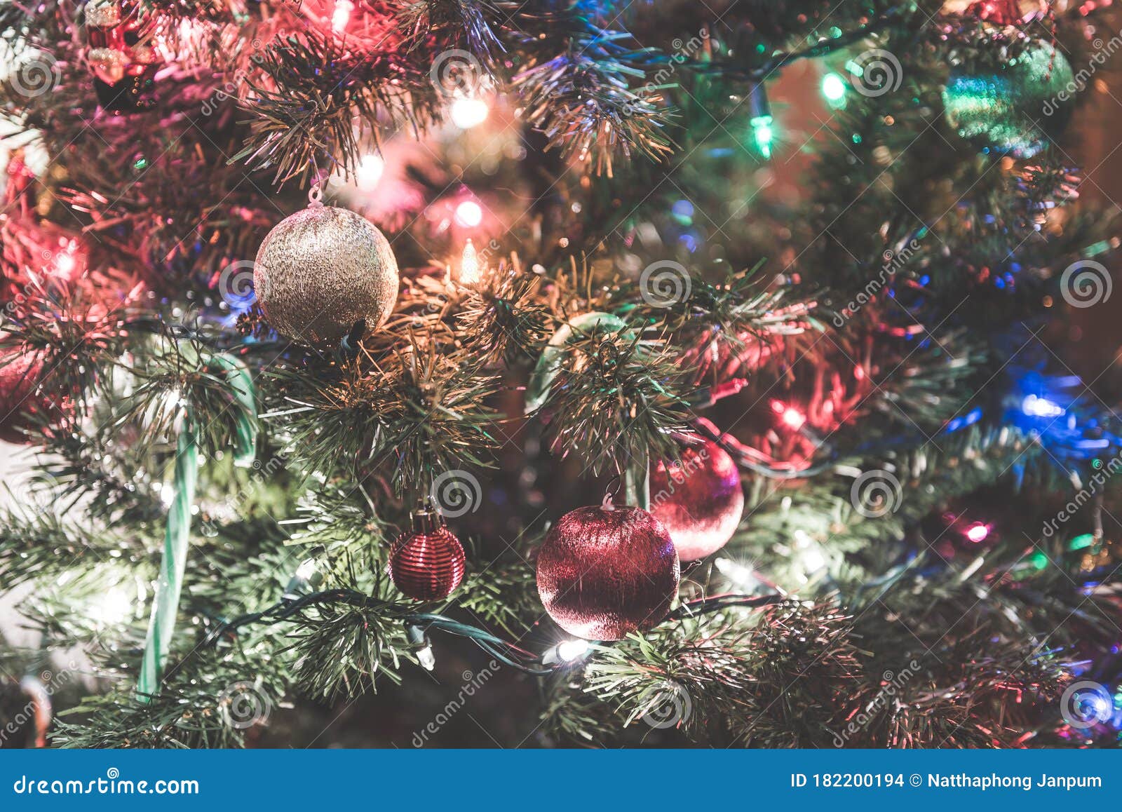 Christmas Tree with Many Ornaments with Led Lighting Bulb Stock Photo