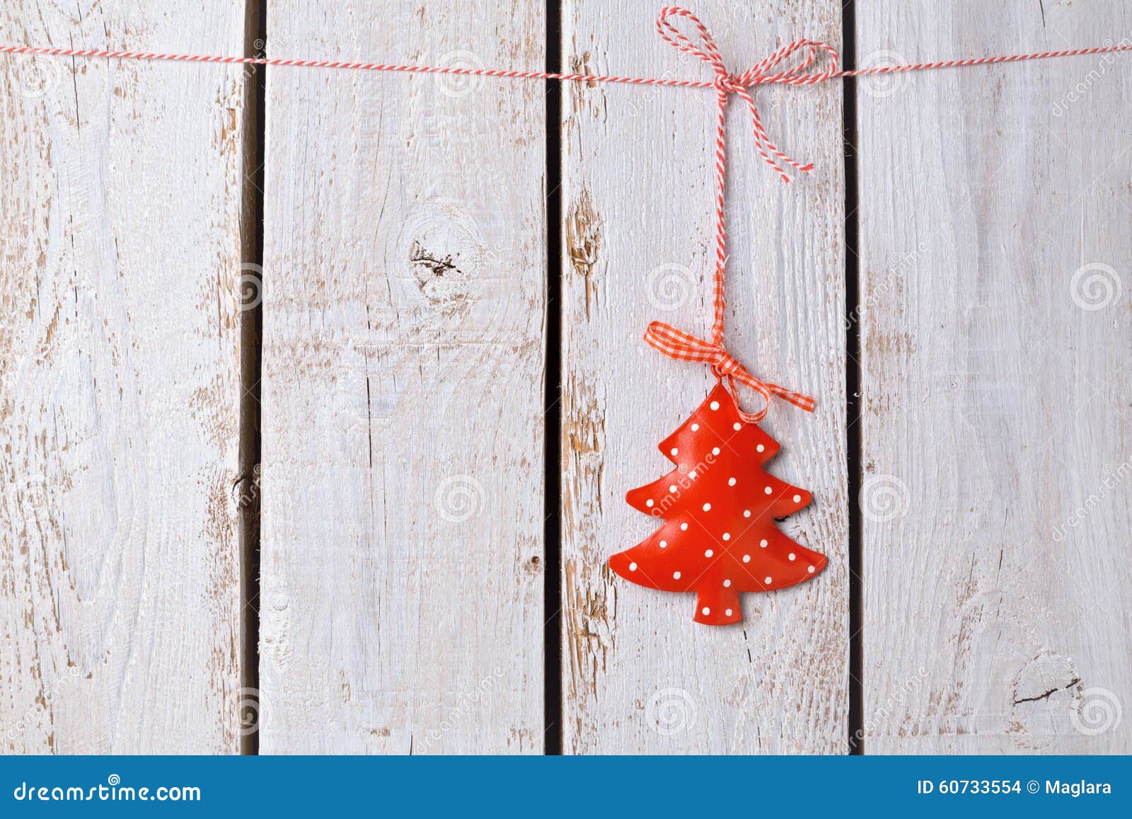 Christmas Tree Ornament Hanging Over White Wooden Background Stock ...