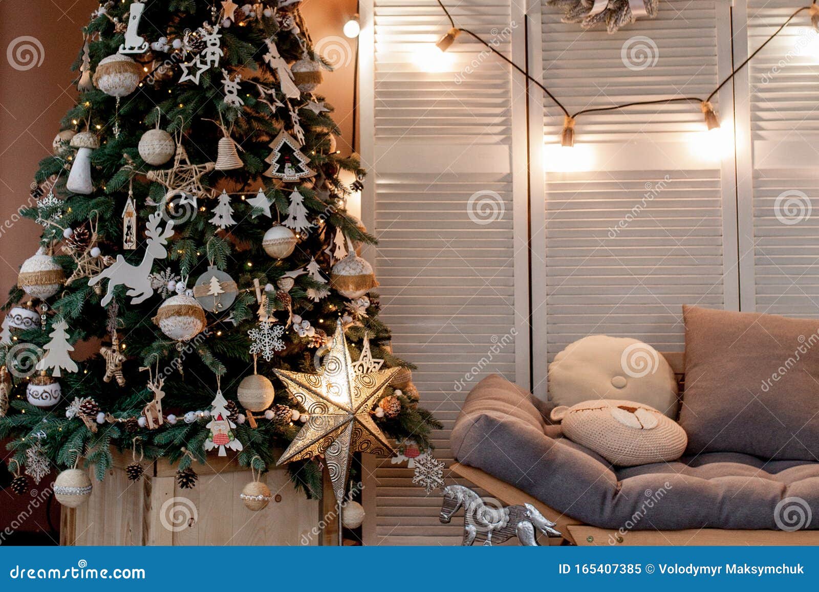 Christmas Tree with Presents Underneath in Living Room Stock Image