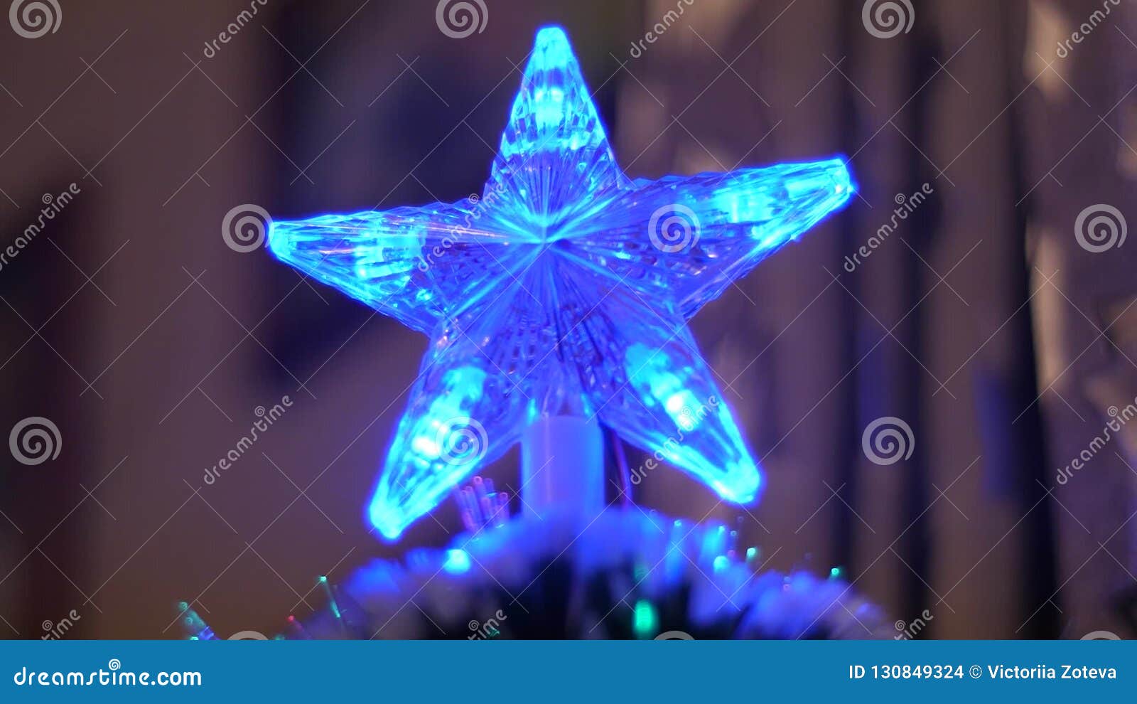 Christmas Star Glows With Colored Lighchristmas Tree In Room Shines With Blue Red Lights Artificial Christmas Tree Is