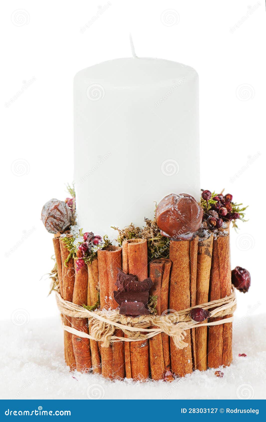 Christmas White Candle In A Candlestick With Cinnamon Stock Image