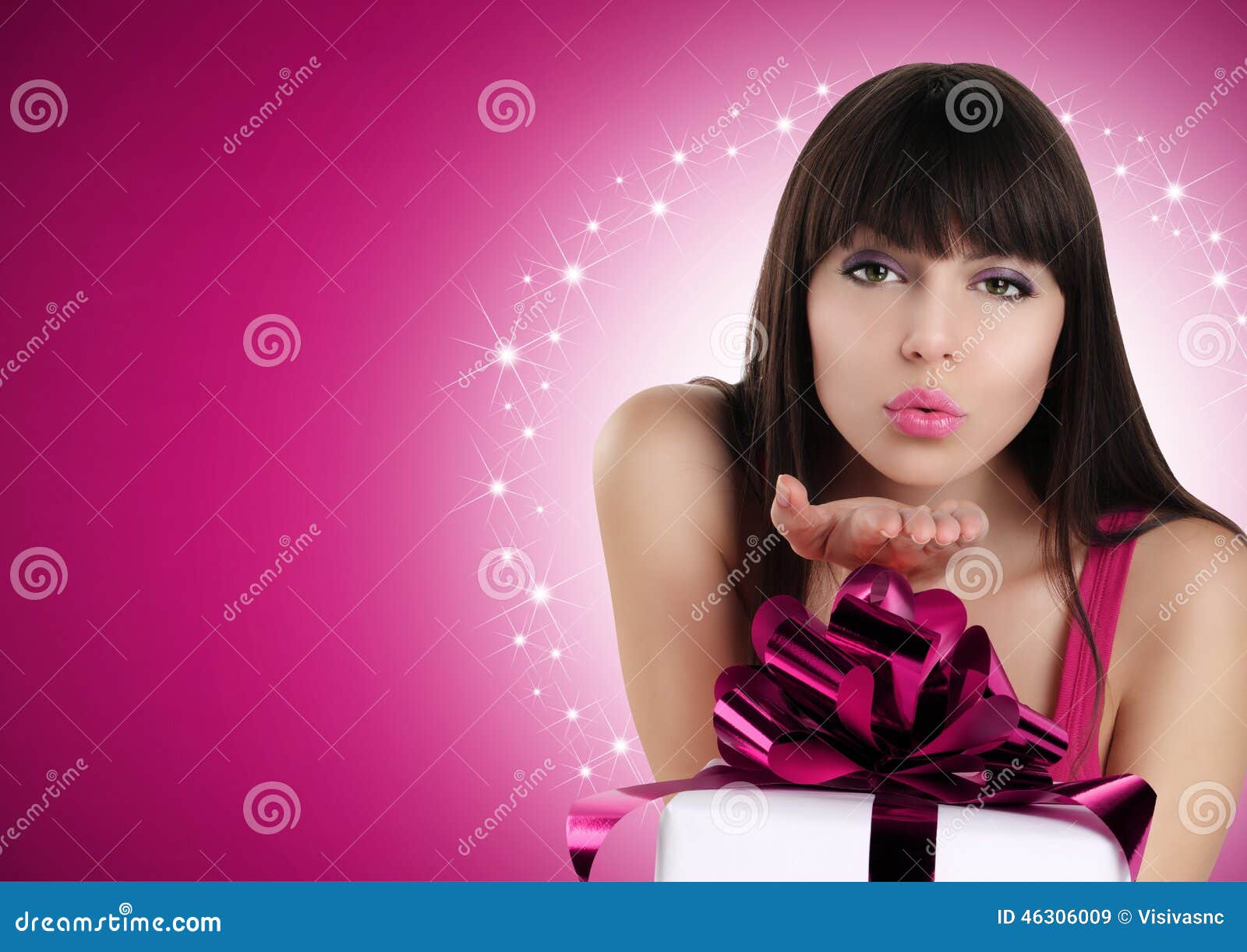 Christmas Woman Blowing Kiss With Gift Box And Red Bow Stock Image ...