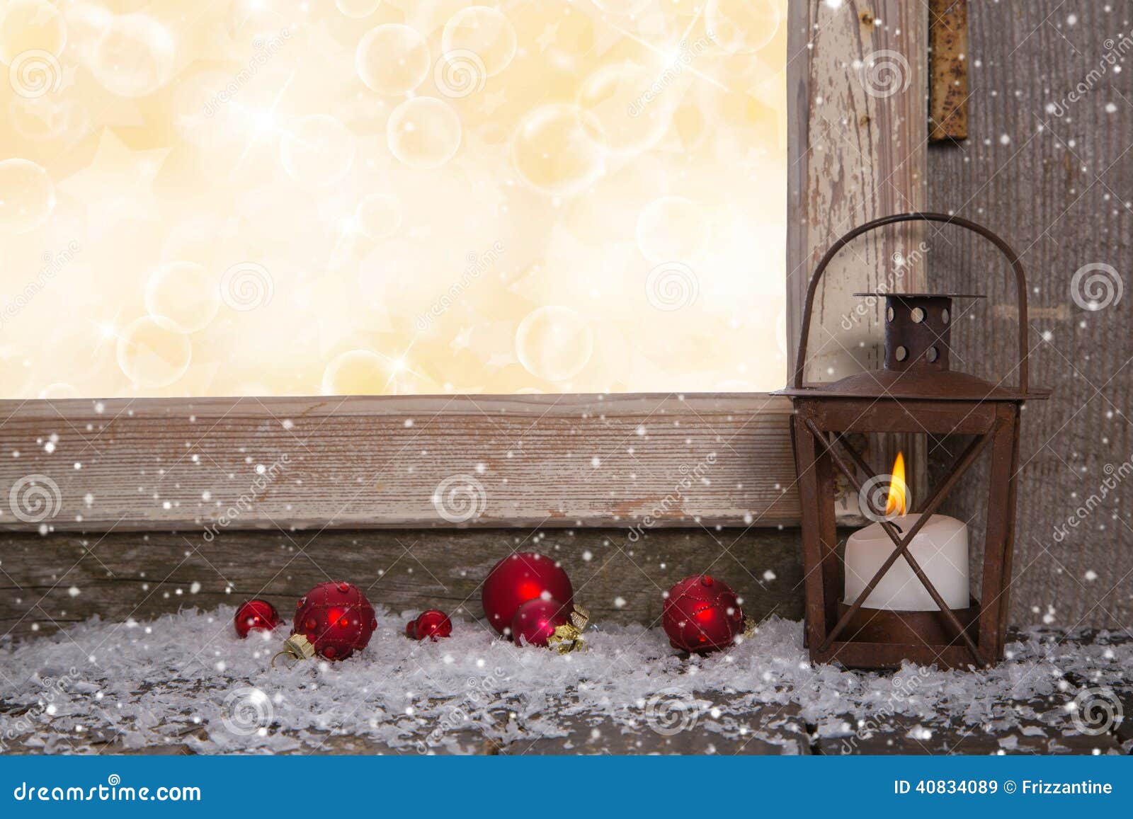 christmas wooden background with an old rustic latern.